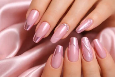 Pink Chrome Nails with glossy mirror chrome finish in blush pink and French tip designs for seasonal nail inspiration.
